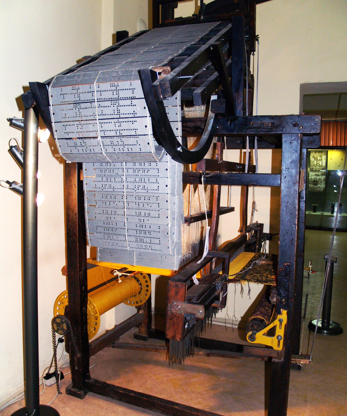 A jacquard hand loom on the weaving floor